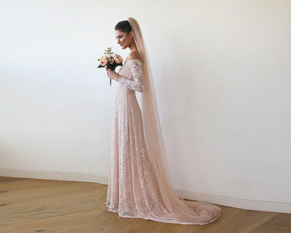 Blush tulle veil detail showing the soft tulle edge