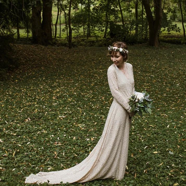 Colette champagne lace gown side view showing the train