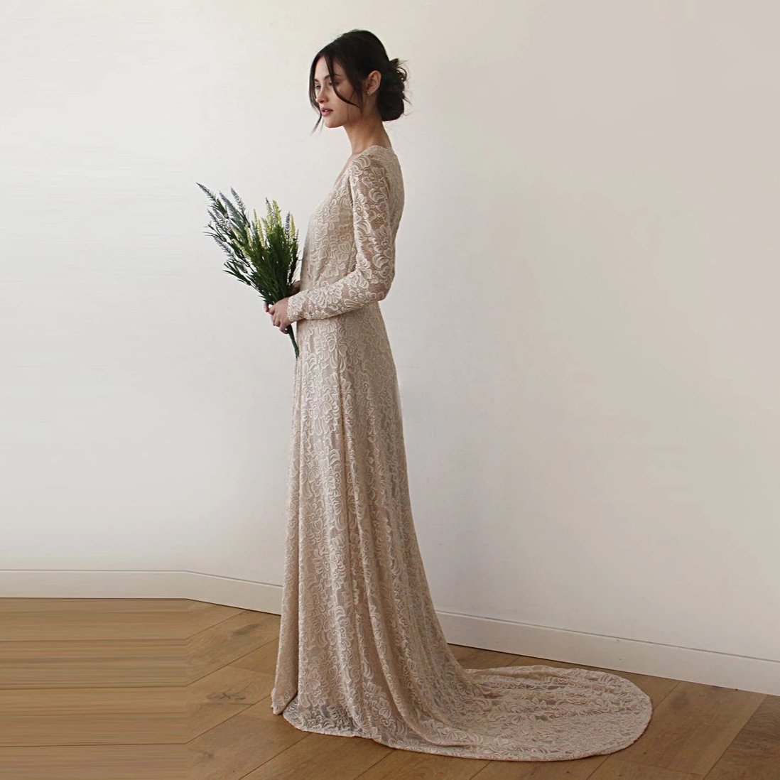 Colette champagne lace gown shown full length on the model