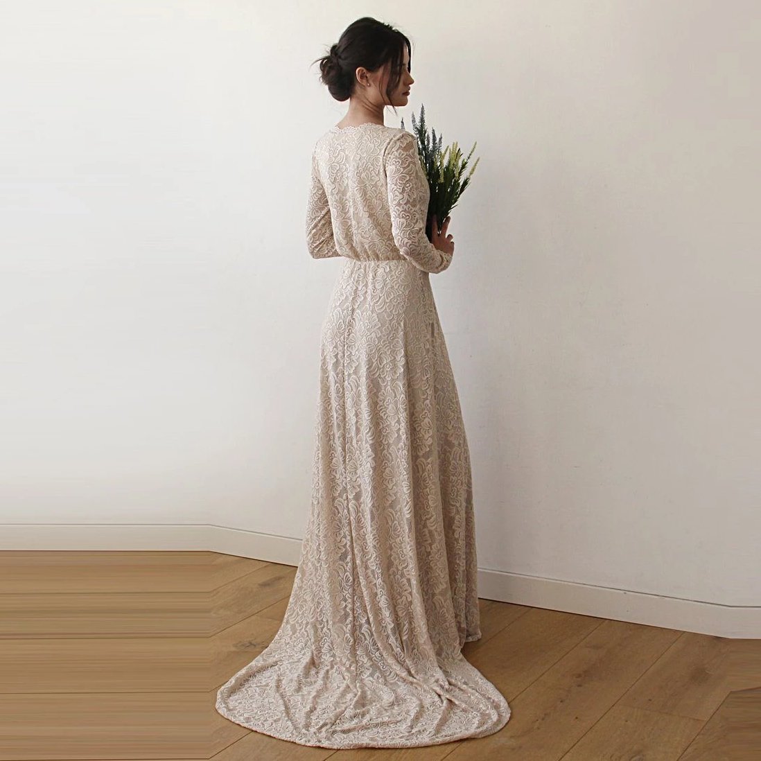 Colette champagne gown showing the full train from behind