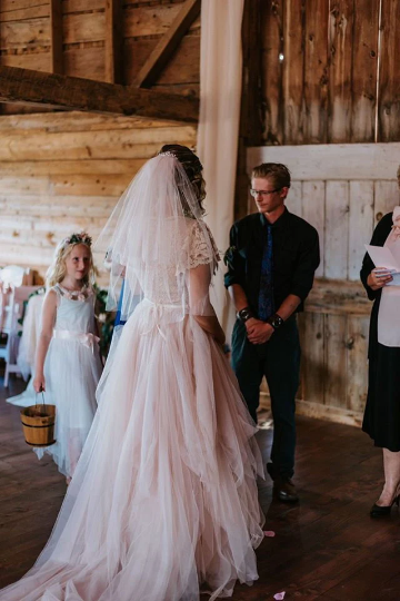 Seraphine blush lace wrap gown shown full length with the tulle skirt