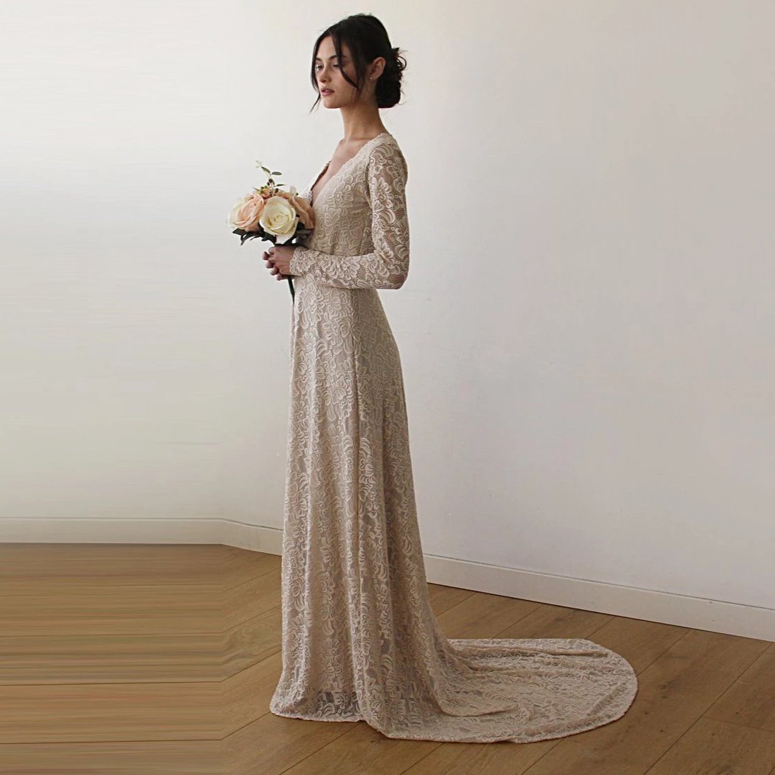 Colette champagne lace gown, front view showing the floral lace and floor-length skirt