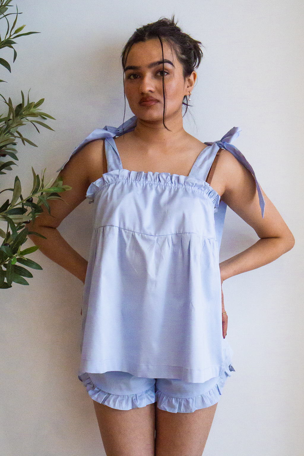 Bow Knot Pajama Set in light blue cotton with tie straps and ruffle shorts