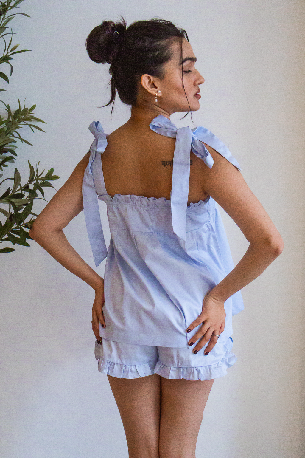 Bow Knot Pajama Set in light blue cotton with tie straps and ruffle shorts