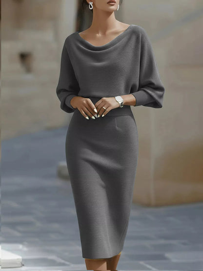 Model in the Silver Screen cowl-neck knit bodycon dress in gray, by Pinup Girl Clothing