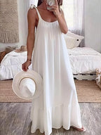 Tie-strap flowy maxi dress in white by Pinup Girl Clothing.