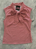 Candy Cane Stripe Bow Top in red and white diagonal stripes with an oversized neck bow