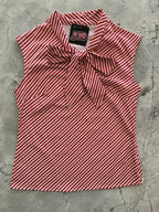 Candy Cane Stripe Bow Top in red and white diagonal stripes with an oversized neck bow