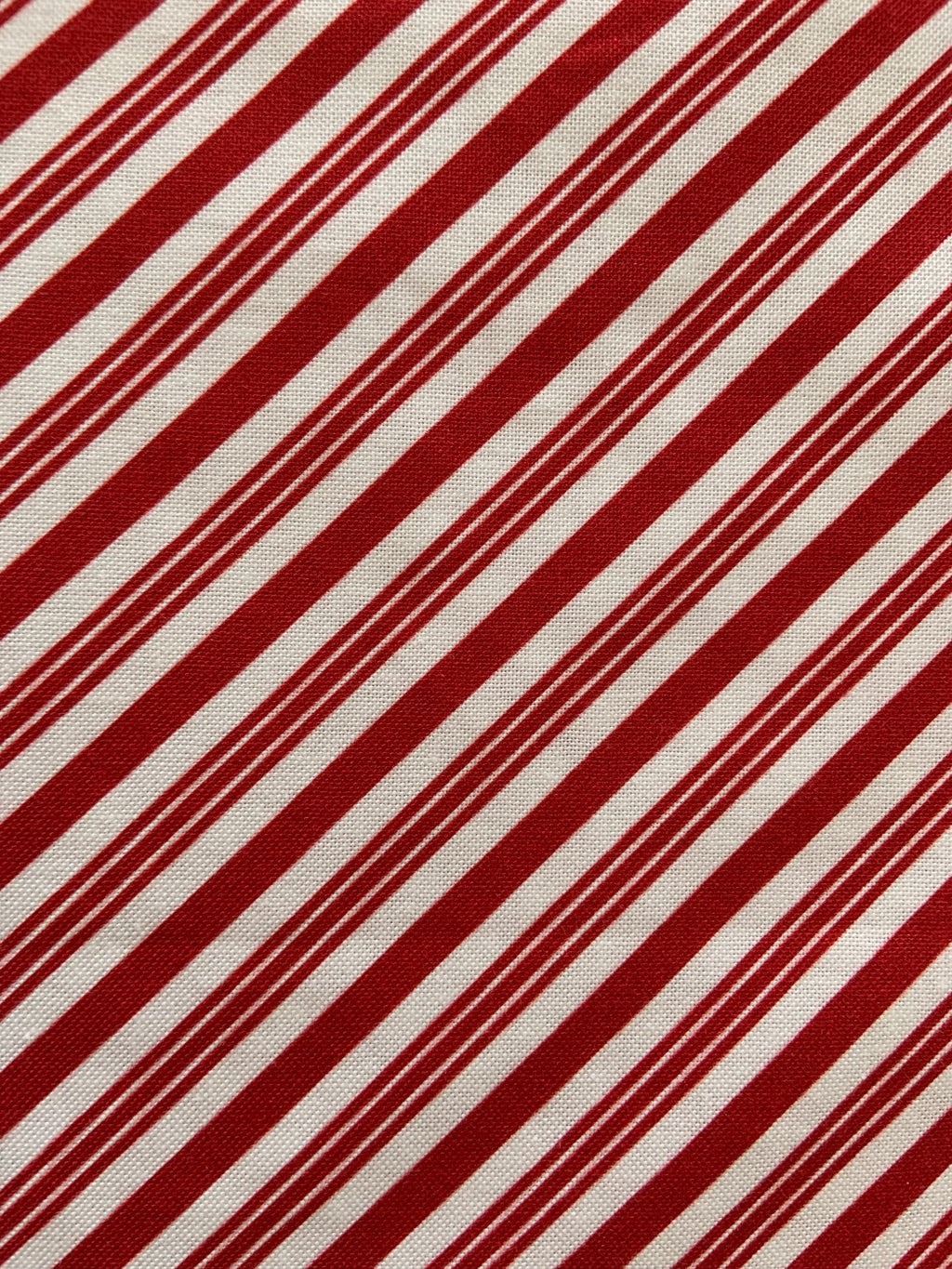 Candy Cane Stripe Bow Top in red and white diagonal stripes with an oversized neck bow
