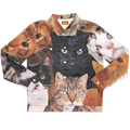 Cat Wrangler Denim Jacket laid flat, denim printed with a photo collage of cat faces: a black cat, tabbies and orange cats