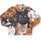 Cat Wrangler Denim Jacket laid flat, denim printed with a photo collage of cat faces: a black cat, tabbies and orange cats