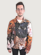 Cat Wrangler Denim Jacket worn open over a white tee, black cat face across the chest