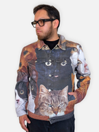 Cat Wrangler Denim Jacket worn open over a black tee, three-quarter view