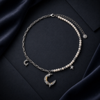 Celestial Dreams set, crescent moon pendant on a pearl chain with matching moon earrings