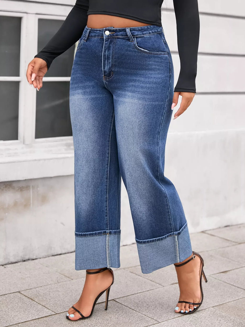 High-rise cuffed wide-leg jeans by Pinup Girl Clothing, in dark blue, sizes 0X to 4X.
