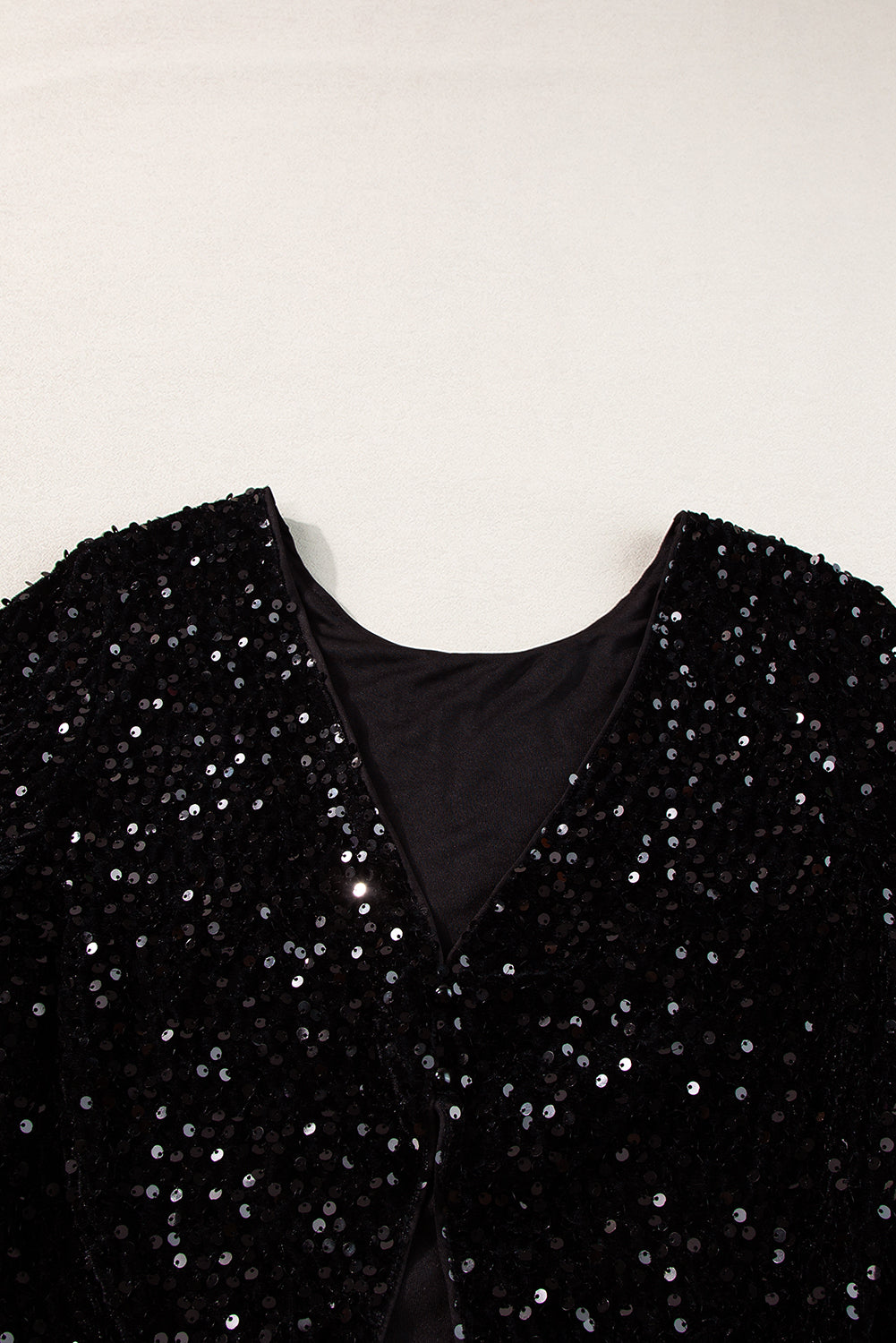 Countdown black sequin long sleeve top, sleeve and cuff detail