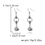 Length and scale of the silver skull and lantern dangle earrings