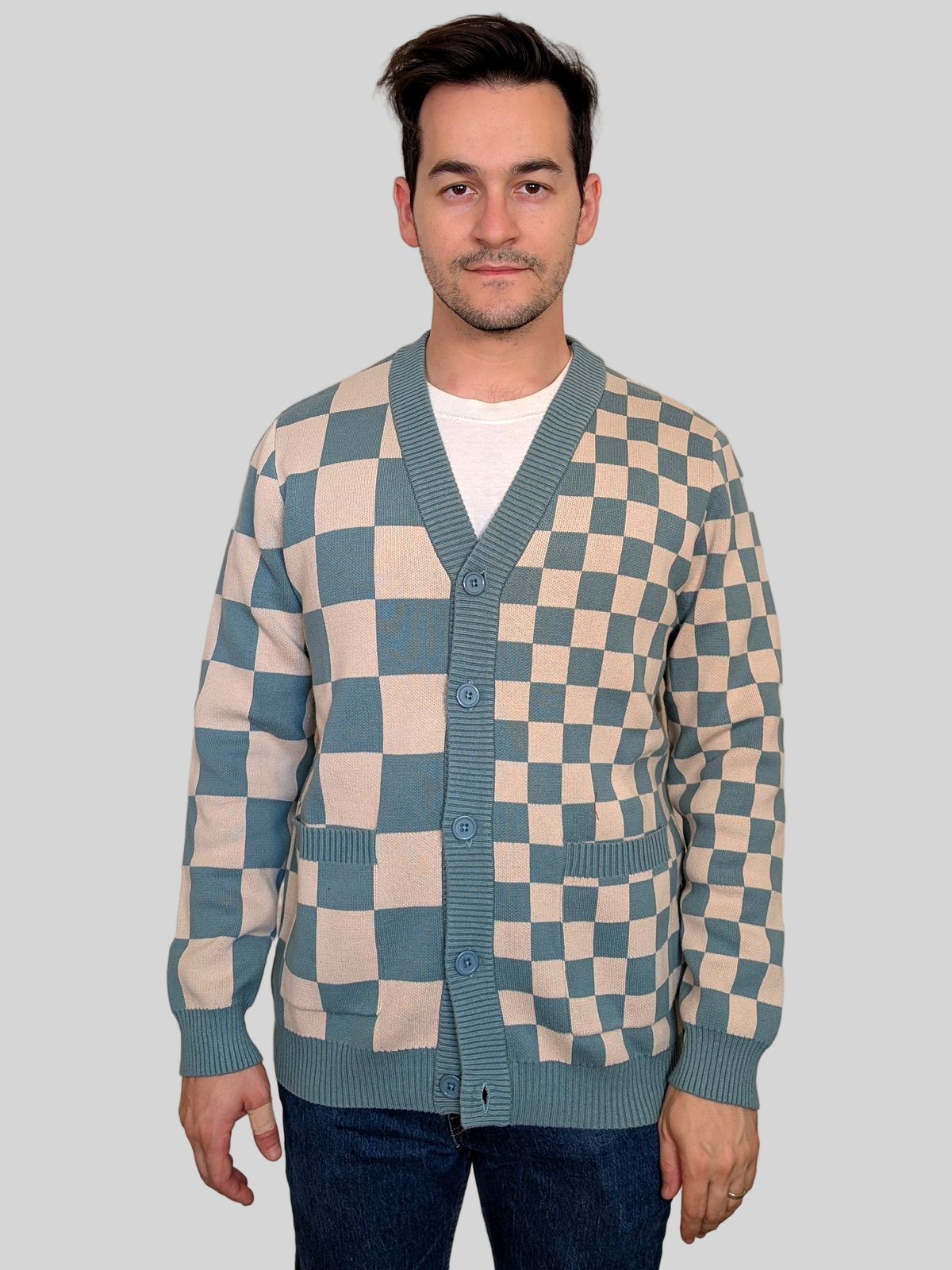 Front view of the Dark Matcha Cardigan buttoned over a white tee, sage green ribbed trim