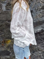 Floral embroidered button-up top for beach to dinner, by Pinup Girl Clothing, sizes XS to 4X.