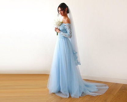 Light blue tulle bridal veil styled with an updo