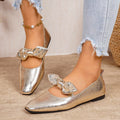 Bow square-toe slip-on flats in gold by Pinup Girl Clothing.