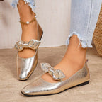 Bow square-toe slip-on flats in gold by Pinup Girl Clothing.