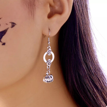 Skull and lantern dangle earrings in silver by Pinup Girl Clothing