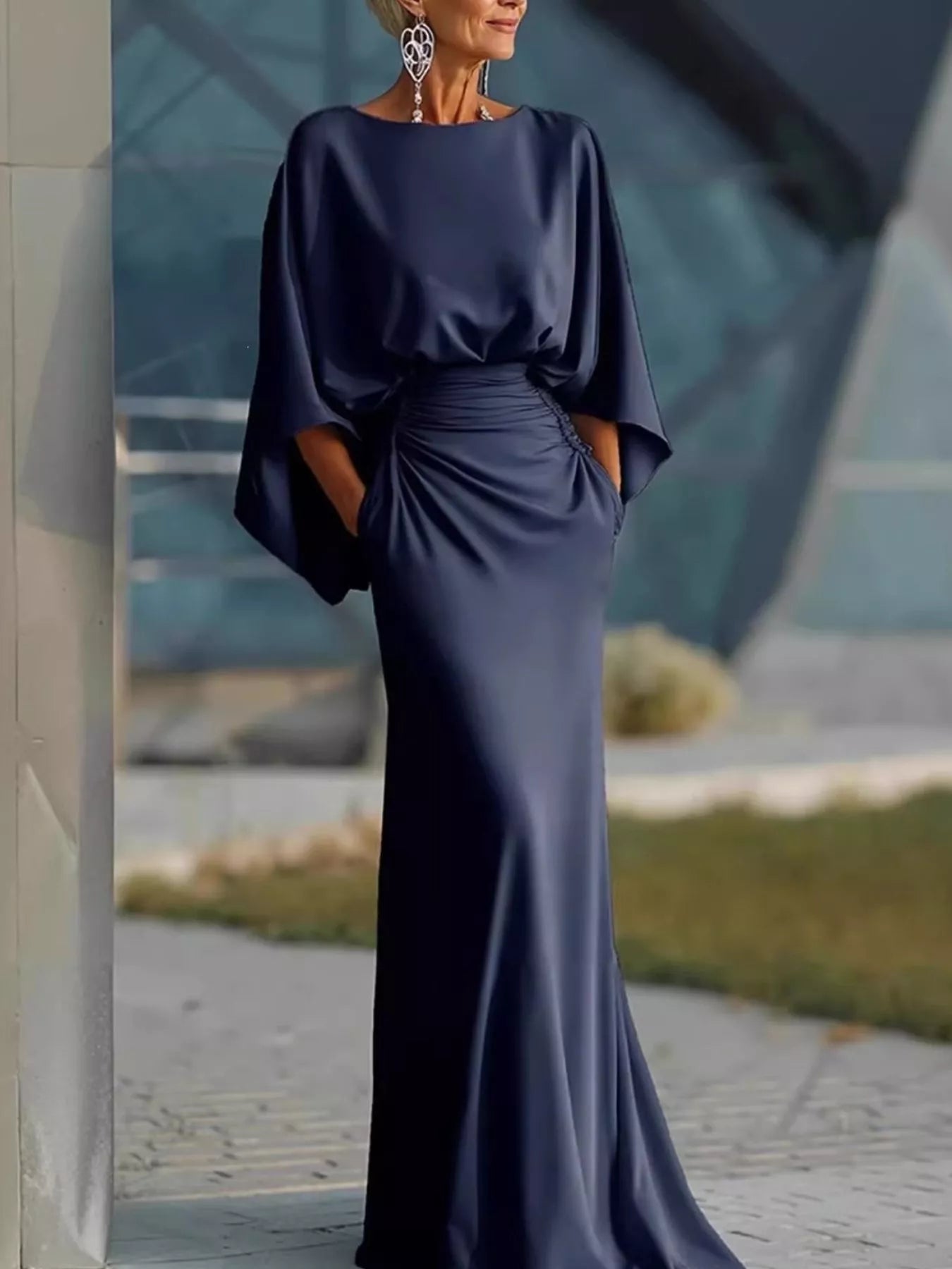 Batwing ruched maxi dress in navy by Pinup Girl Clothing.