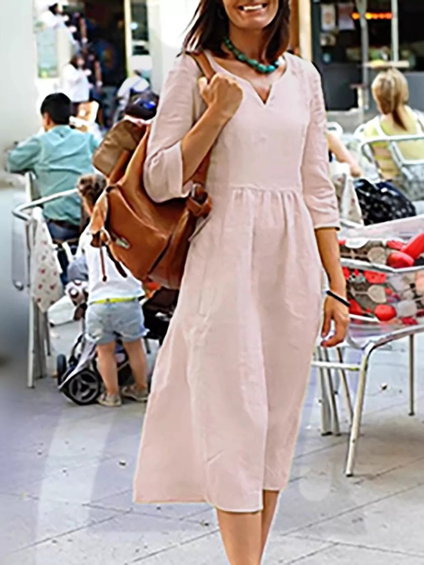 Giulia notched neck cotton midi swing dress with pockets in pink by Pinup Girl Clothing