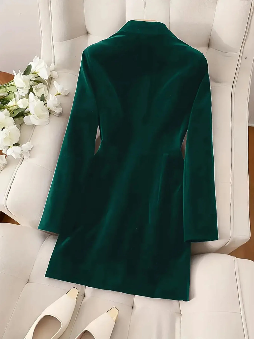 Emerald green velvet blazer mini dress with gold-tone buttons, styled for a party, by Pinup Girl Clothing