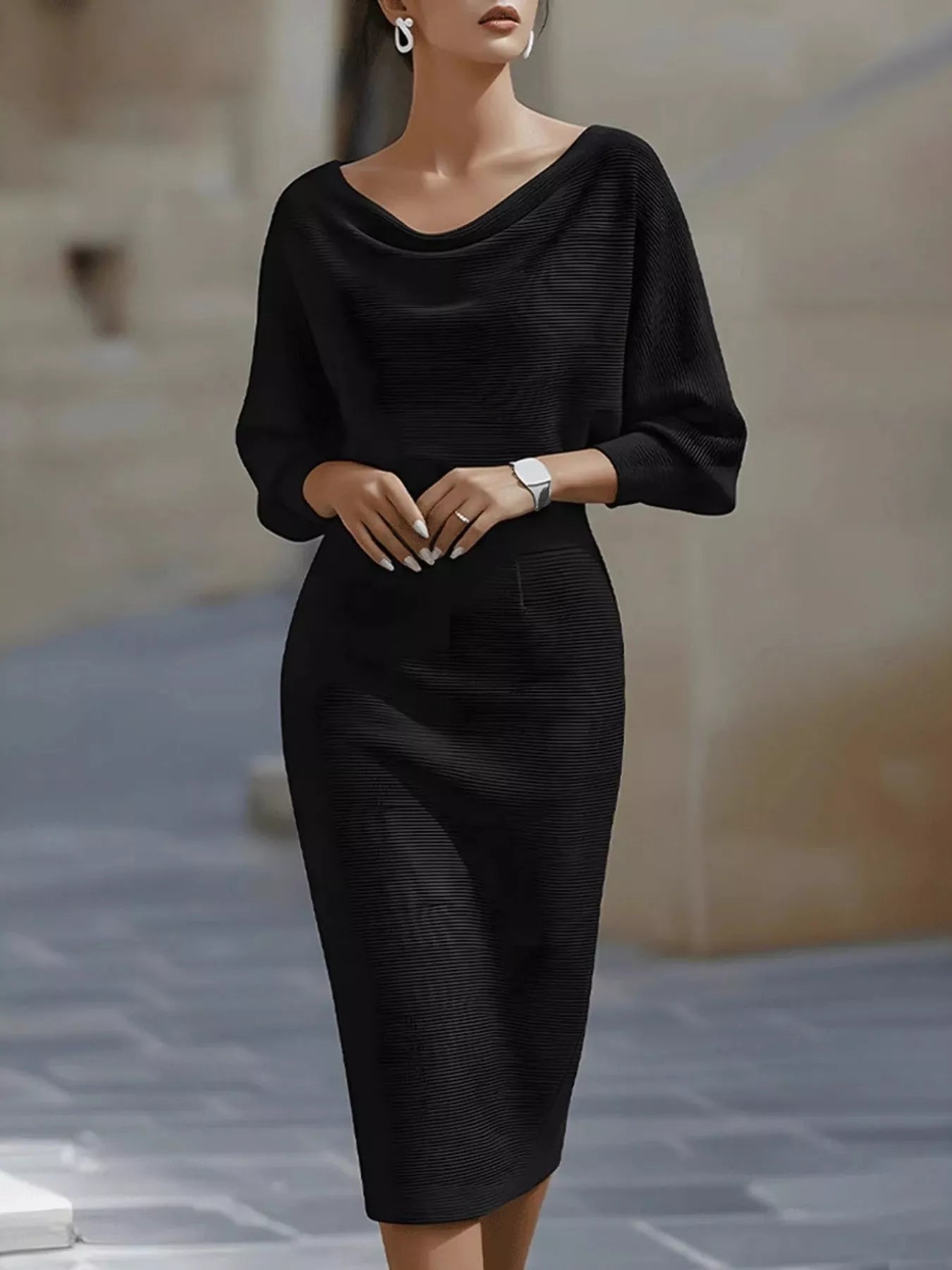 Model in the Silver Screen cowl-neck knit bodycon dress in black, by Pinup Girl Clothing