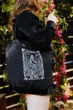Fae Witch Tote Bag, black organic cotton tote with white fae witch art