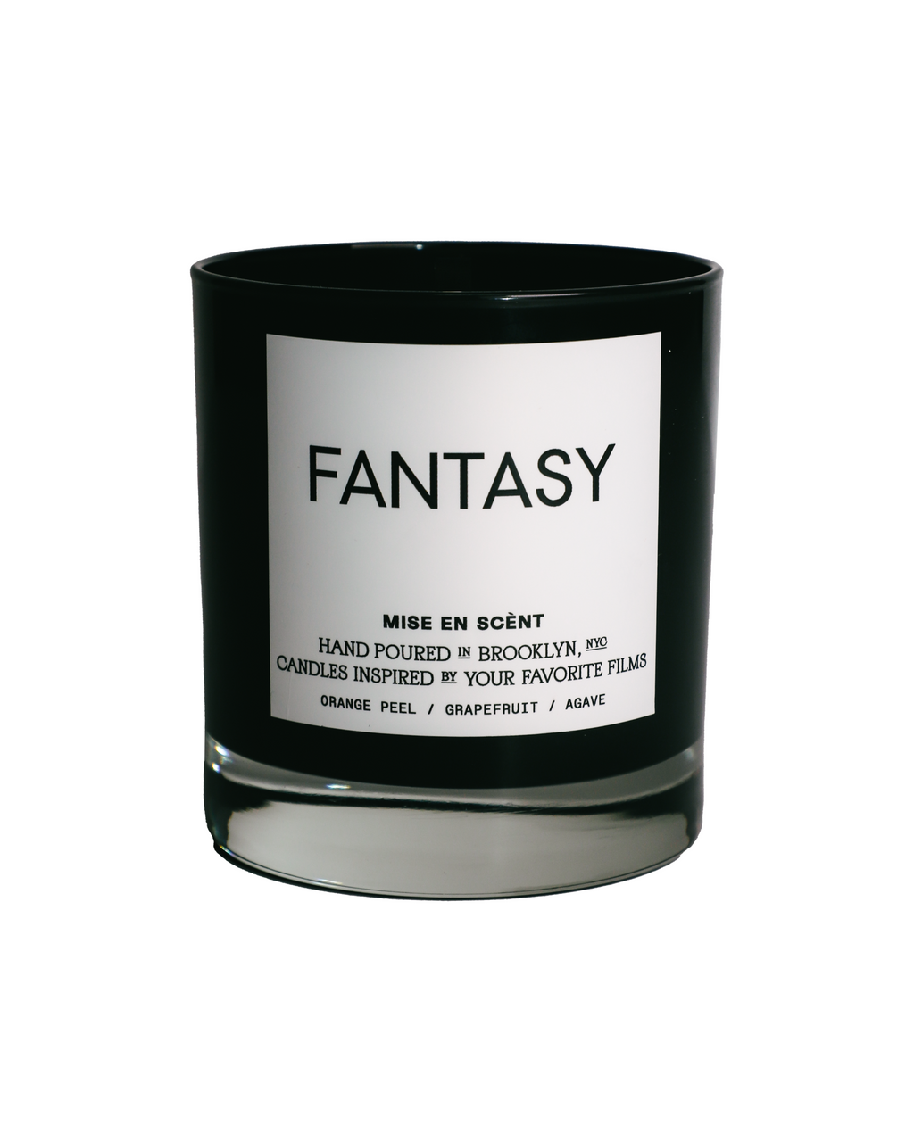 Fantasy scented soy candle in a black glass jar