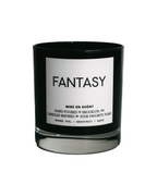 Fantasy scented soy candle in a black glass jar