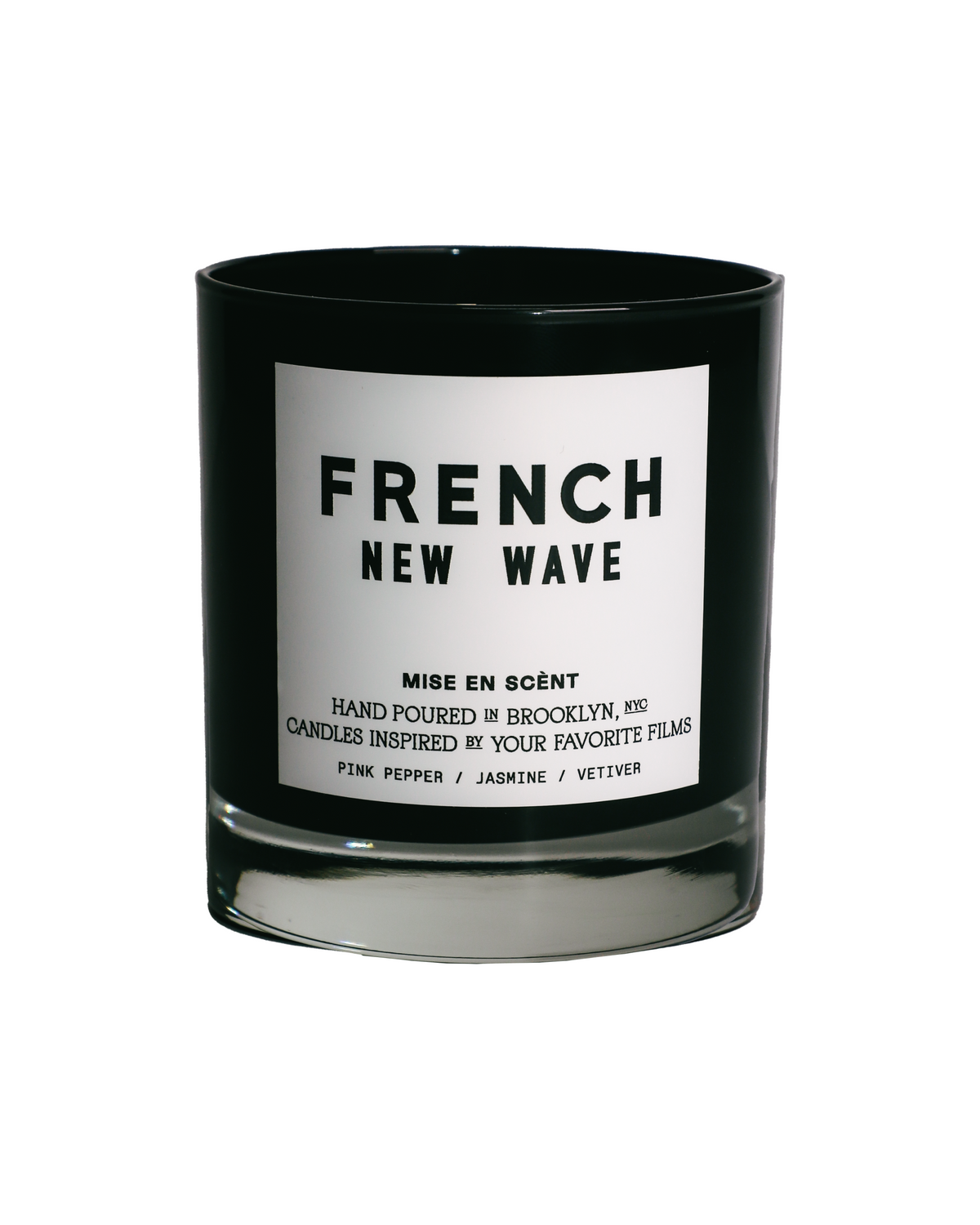 French New Wave scented soy candle in a black glass jar