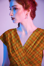 Orange Plaid Greta Dress, a 1950s cotton swing dress with a surplice neckline and gathered waist