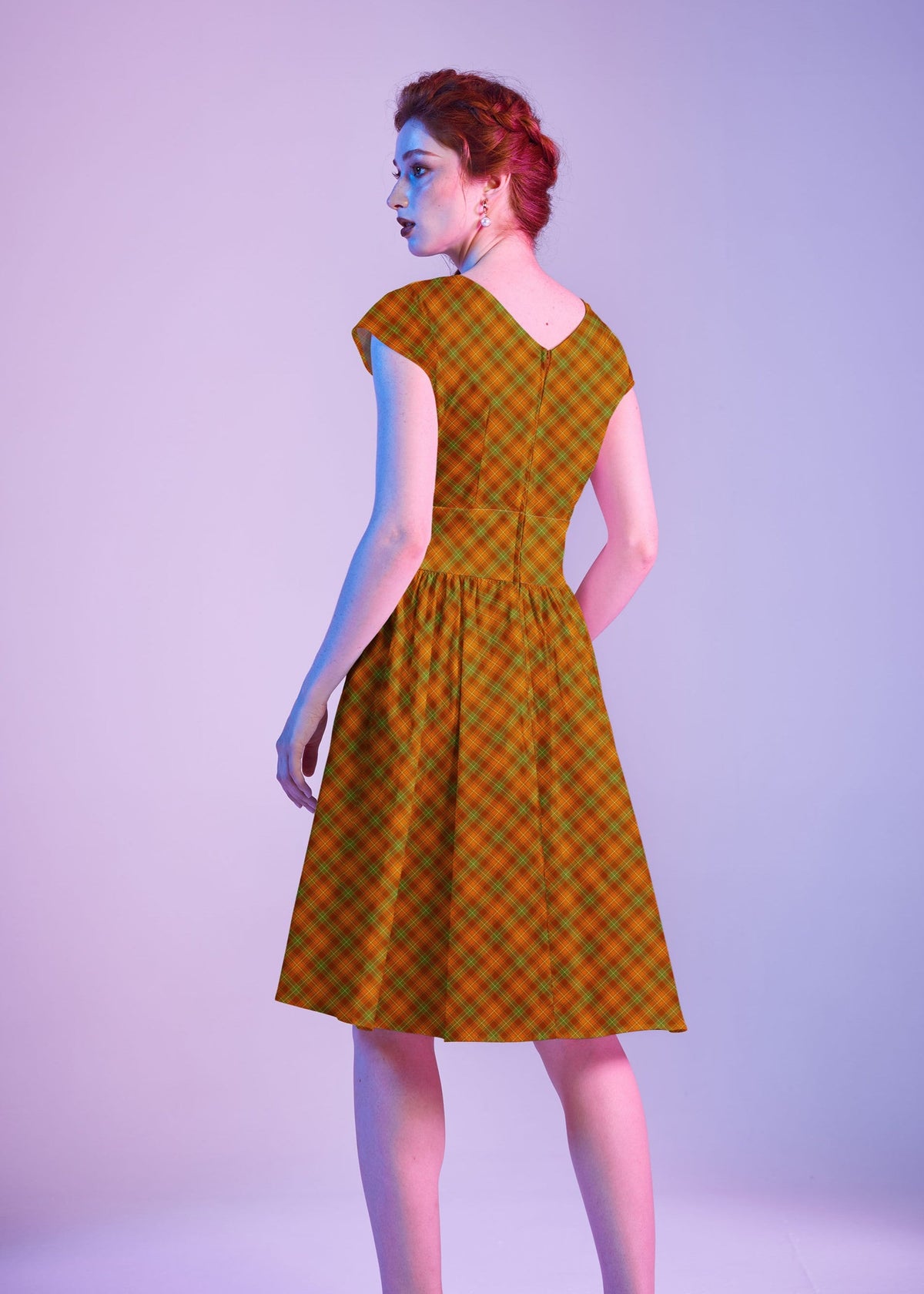 Orange Plaid Greta Dress, a 1950s cotton swing dress with a surplice neckline and gathered waist