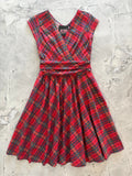 Red Plaid Greta Dress, a 1950s cotton swing dress with a surplice neckline and gathered waist