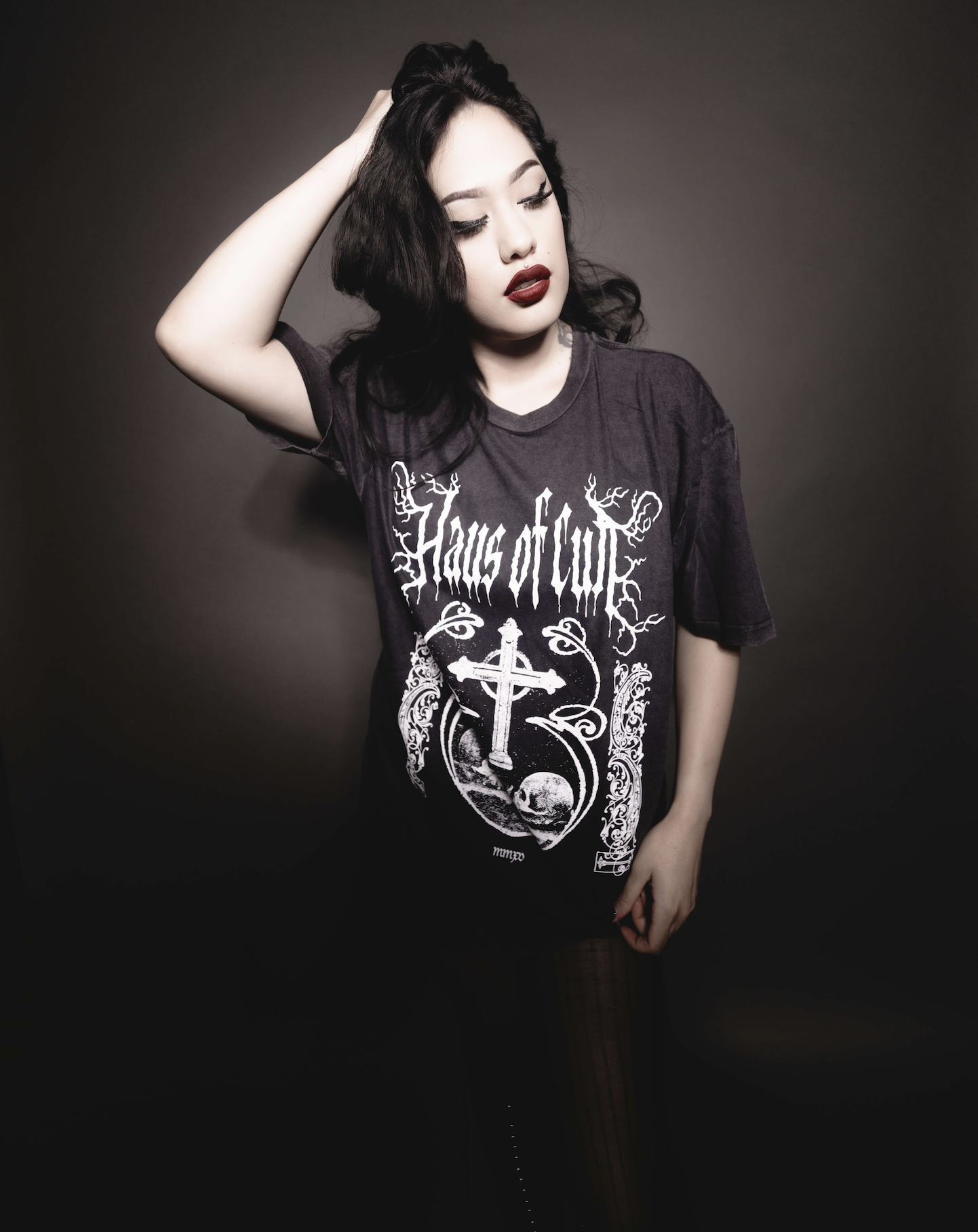 White cross and skull print on the black Haus Of Cult tee