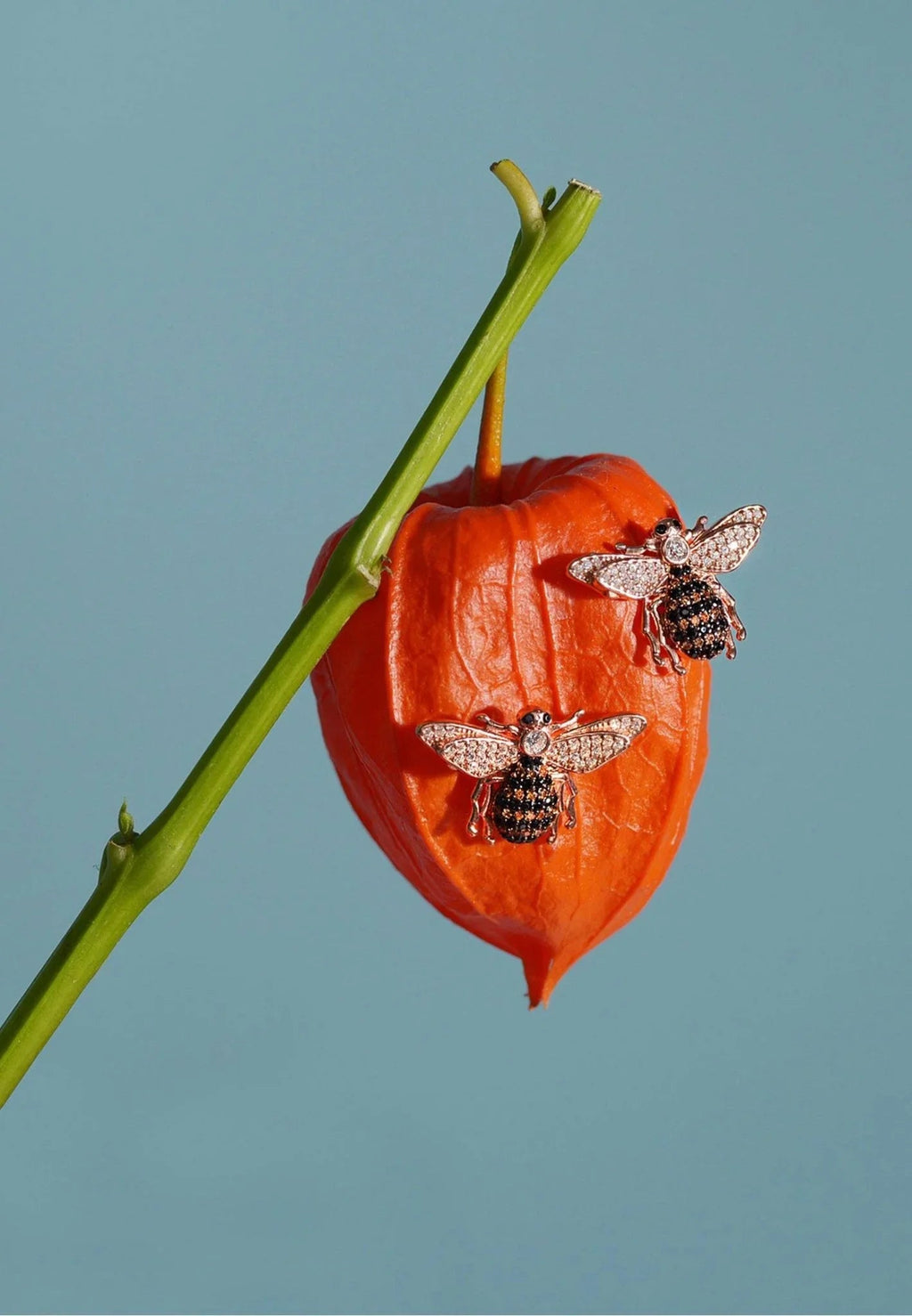 Honey Bee stud earrings in sterling silver with a bee charm and sparkling zircons, by Pinup Girl Clothing