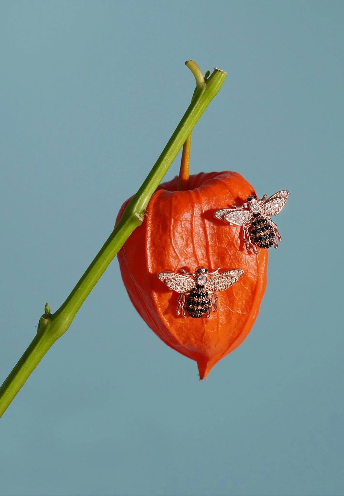 Honey Bee stud earrings in sterling silver with a bee charm and sparkling zircons, by Pinup Girl Clothing