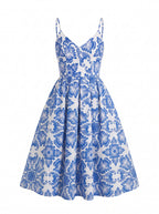 Amalie 70s ballerina swing dress in blue Noto tile print, product shot on a white background