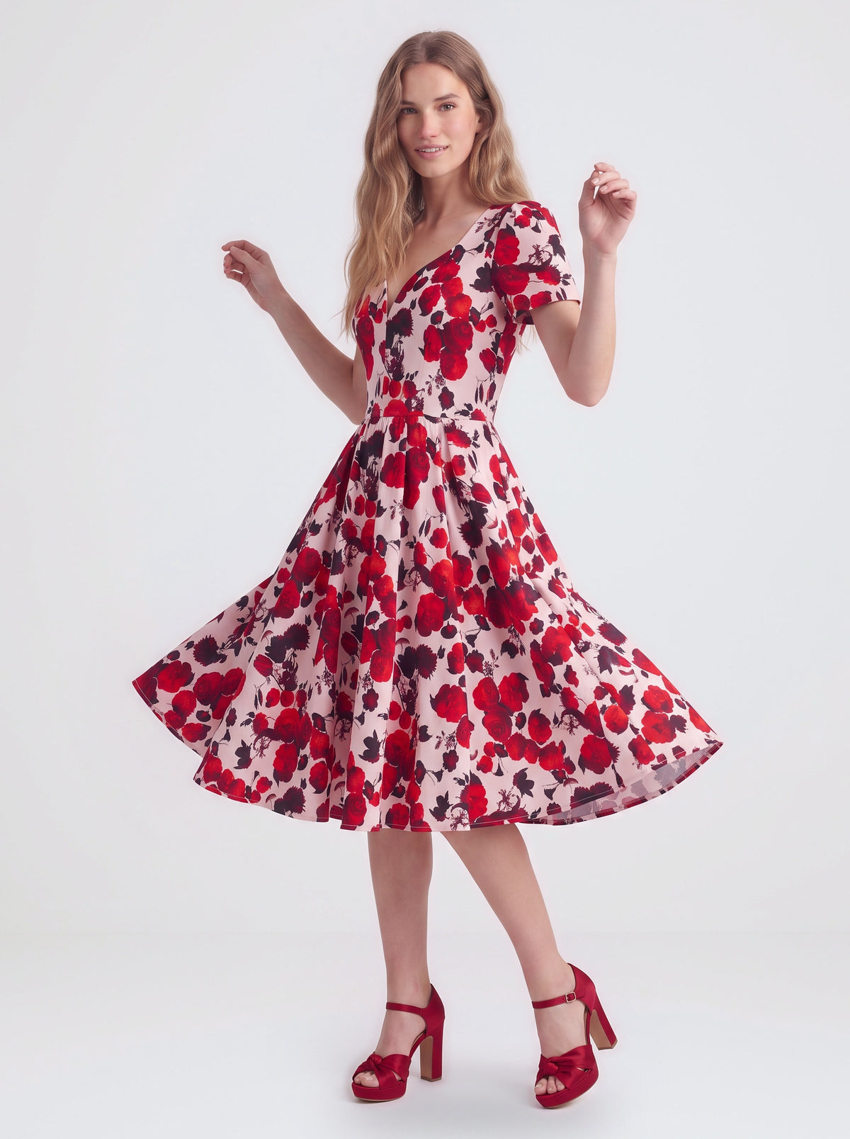 Lilith swing dress in Fiori Dolce, a red and white floral, with eyelash lace and a full skirt, by Pinup Girl Clothing
