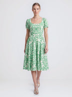 Amara swing dress in green and white Noto Tile print with puff sleeves and a full swing skirt, by Pinup Girl Clothing