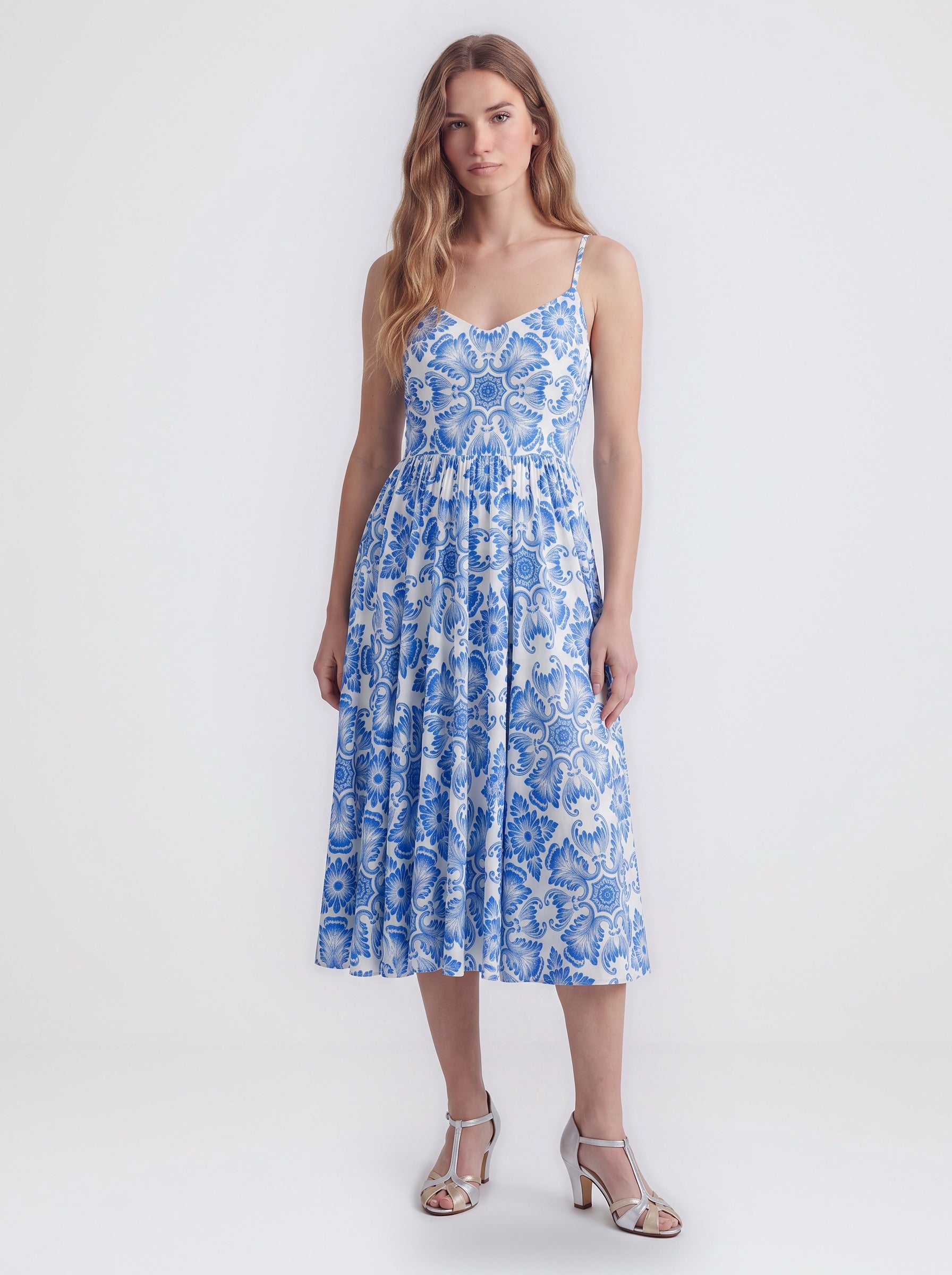 Amalie 70s ballerina swing dress in blue Noto tile print, full front view on a clean studio background