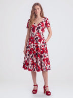 Lilith swing dress in Fiori Dolce, a red and white floral, with eyelash lace and a full skirt, by Pinup Girl Clothing