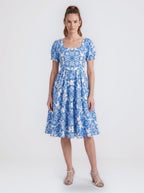 Amara swing dress in blue and white Noto Tile print with puff sleeves and a full swing skirt, by Pinup Girl Clothing