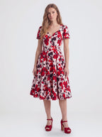 Lilith swing dress in Fiori Dolce, a red and white floral, with eyelash lace and a full skirt, by Pinup Girl Clothing