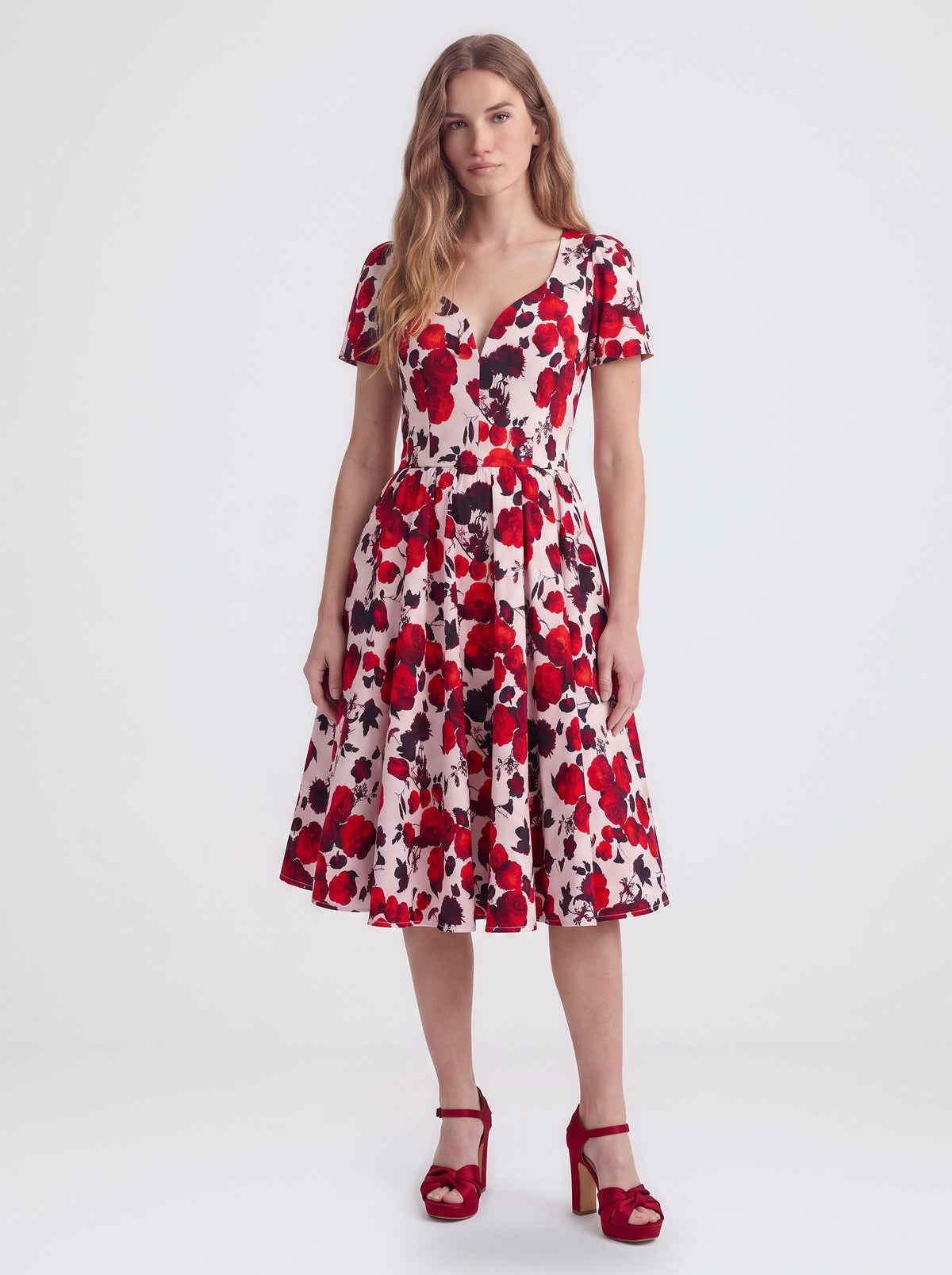 Lilith swing dress in Fiori Dolce, a red and white floral, with eyelash lace and a full skirt, by Pinup Girl Clothing