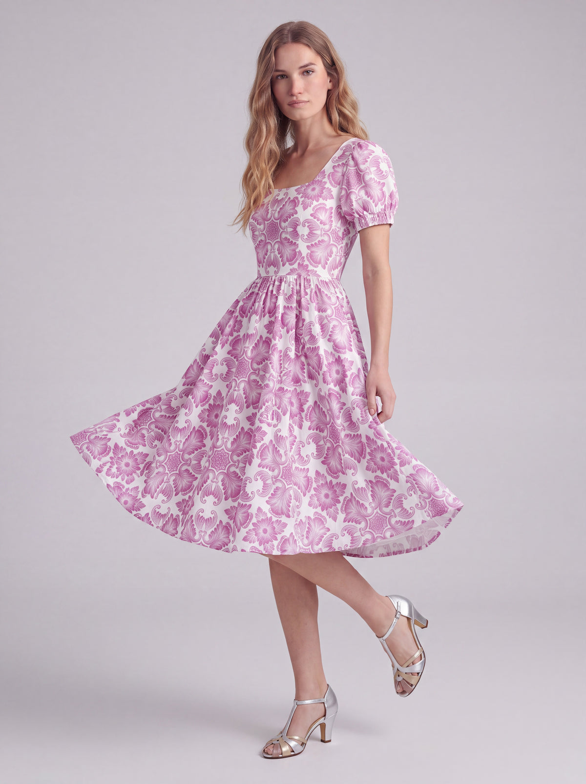 Amara swing dress in pink and white Noto Tile print with puff sleeves and a full swing skirt, by Pinup Girl Clothing